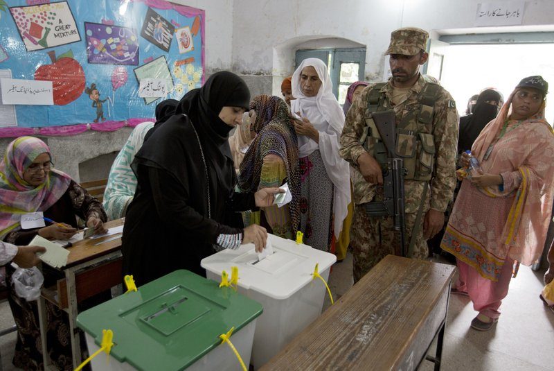 A Pakistani woman casts her vote on July 25, 2018. (AP Photo/B.K. Bangash)
