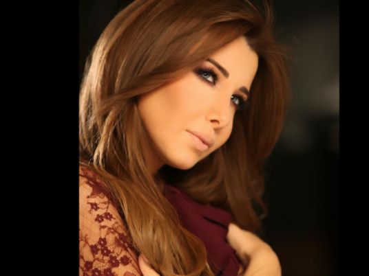 9. Nancy Ajram's Blonde Hair Inspiration for Your Next Salon Visit - wide 2