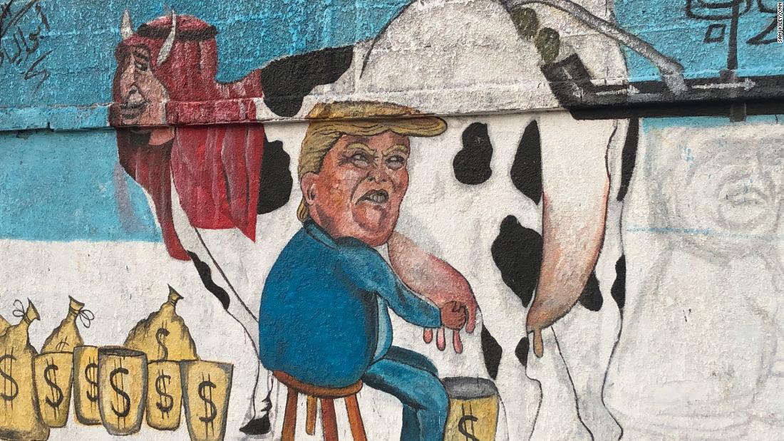Mural of Trump milking Saudi king shows Yemenis disgust at war - Egypt  Independent