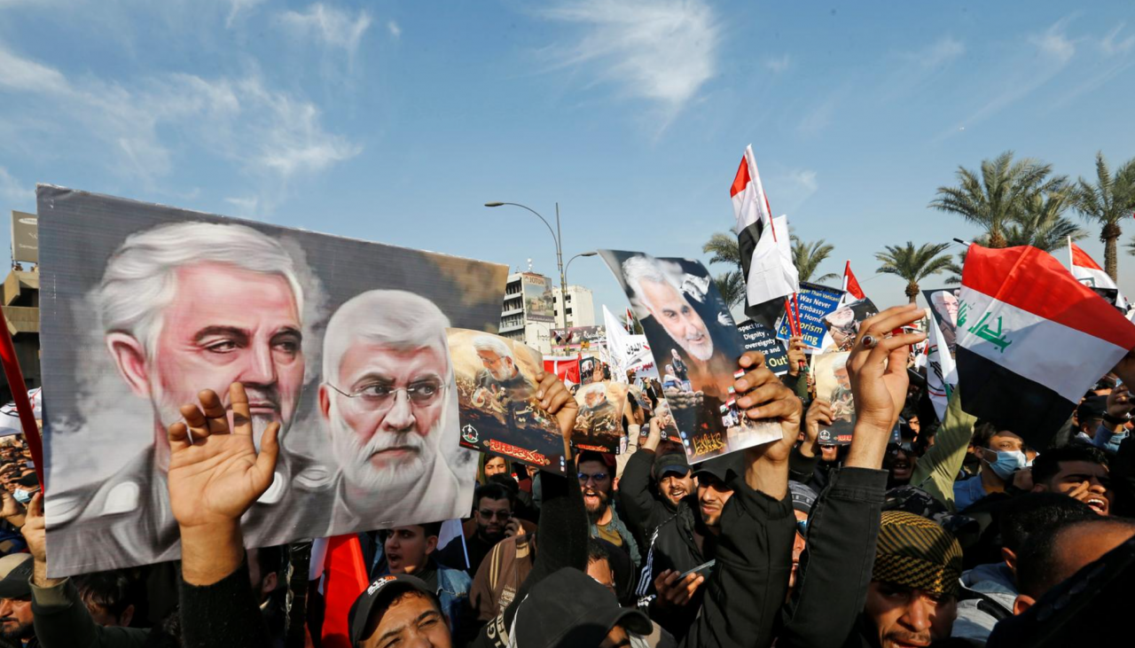 Chanting anti-US slogans, Iraqi militia supporters mark year since Soleimani’s killing