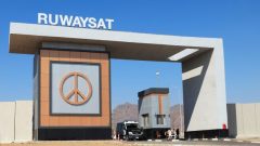 IMAGE: A police guard at the Ruwaysat entrance of the security cement barrier built around the Red Sea resort of Sharm el-Sheikh, Egypt on February 6, 2021. Amr Abdallah Dalsh/Reuters