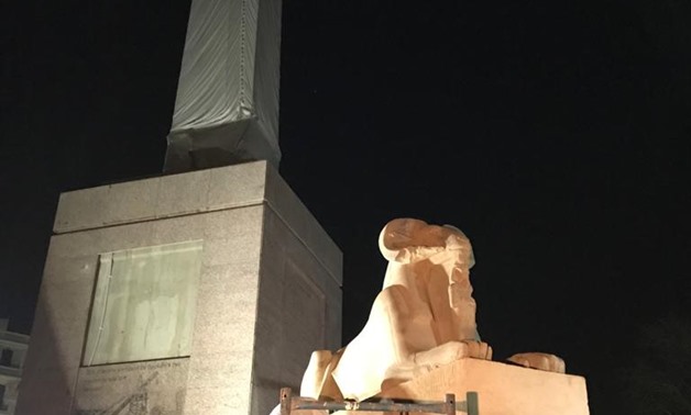 four ram-headed sphinxes placed at Tahrir Square.