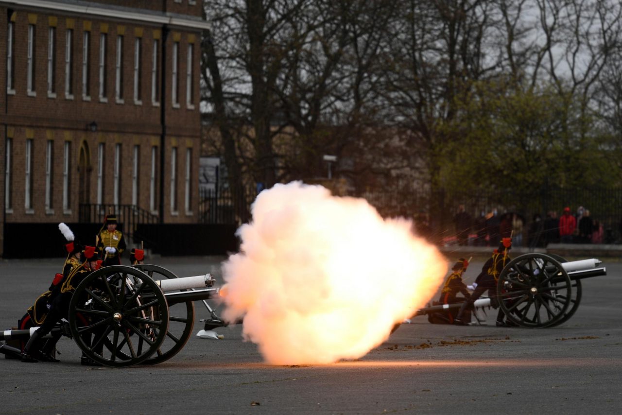 With artillery guns and flowers, Britain salutes Prince Philip