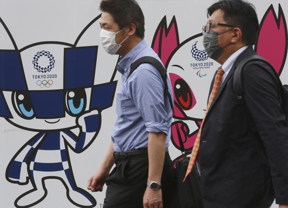 Japan announces easing of virus emergency ahead of Olympics