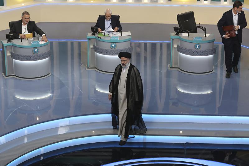 Outgoing Iran president, a debate target, defends his record Outgoing Iran president, a debate target, defends his record