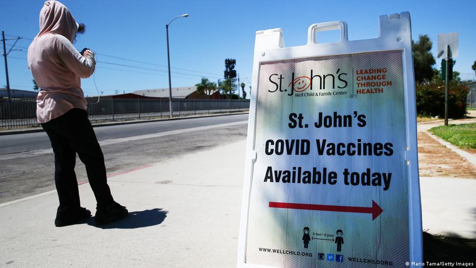 Biden encourages cash vaccine incentives in US