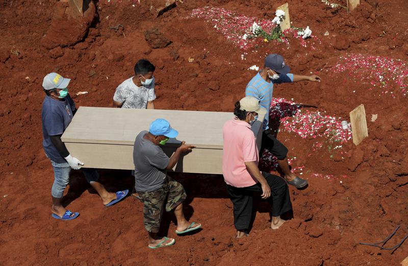 Indonesia surpasses 100,000 deaths amid new virus wave
