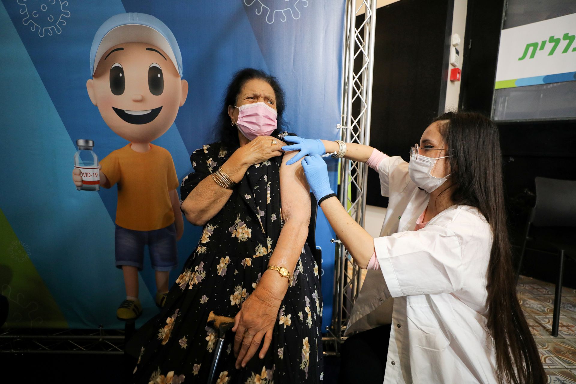 Israel expands COVID vaccine booster campaign to over 50s, health workers