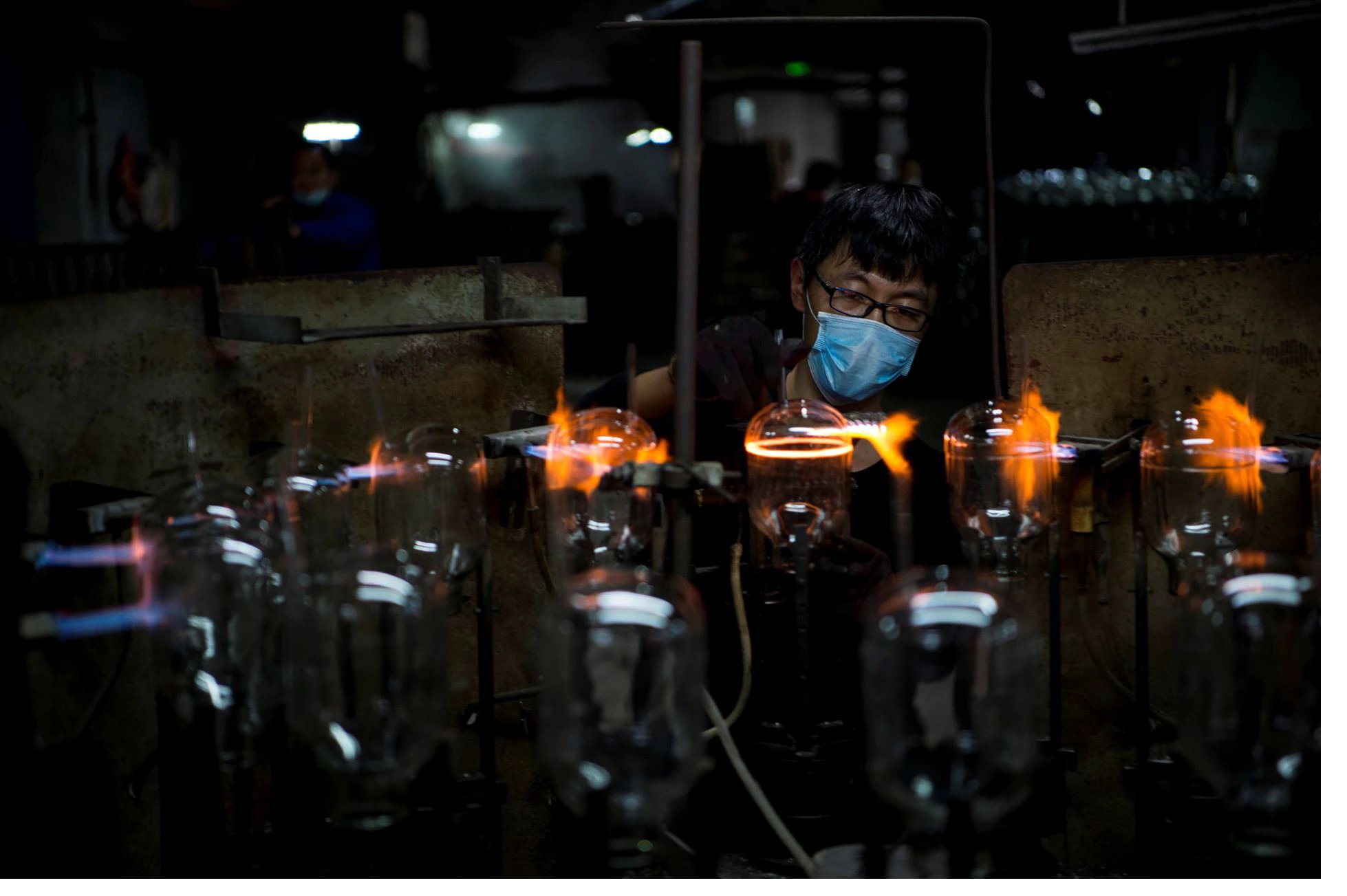 China economy under pressure as factory output, retail sales growth slow sharply