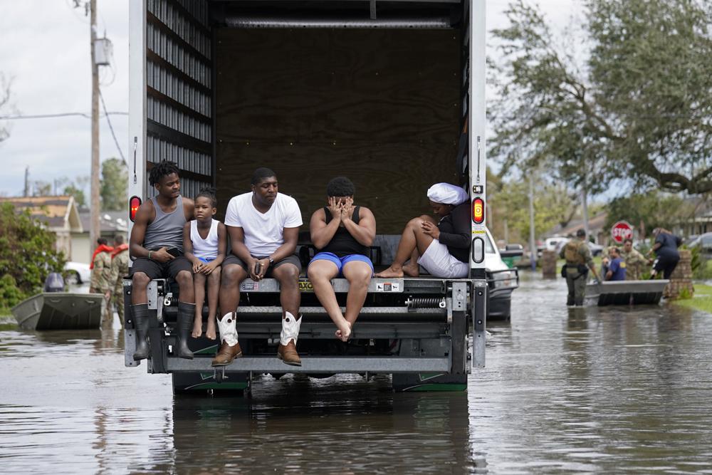 New Orleans levees pass Ida’s test while some suburbs flood