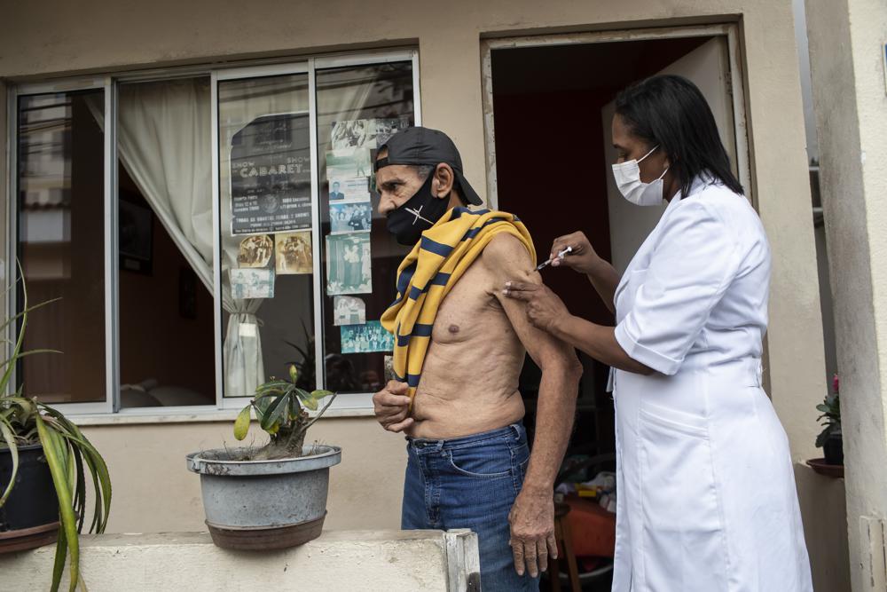 Brazil starts booster shots while many still await a 2nd jab