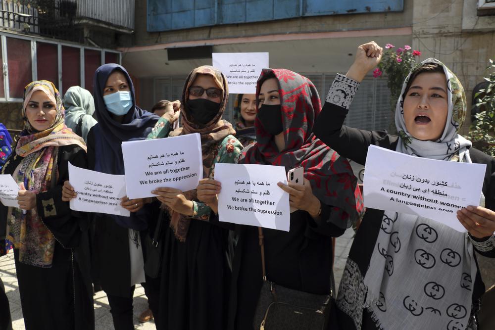 The Latest: Taliban fire weapons into air, at least 2 killed