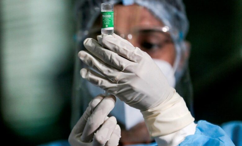 A health worker draws a dose of the AstraZeneca coronavirus vaccine. Photo: Reuters