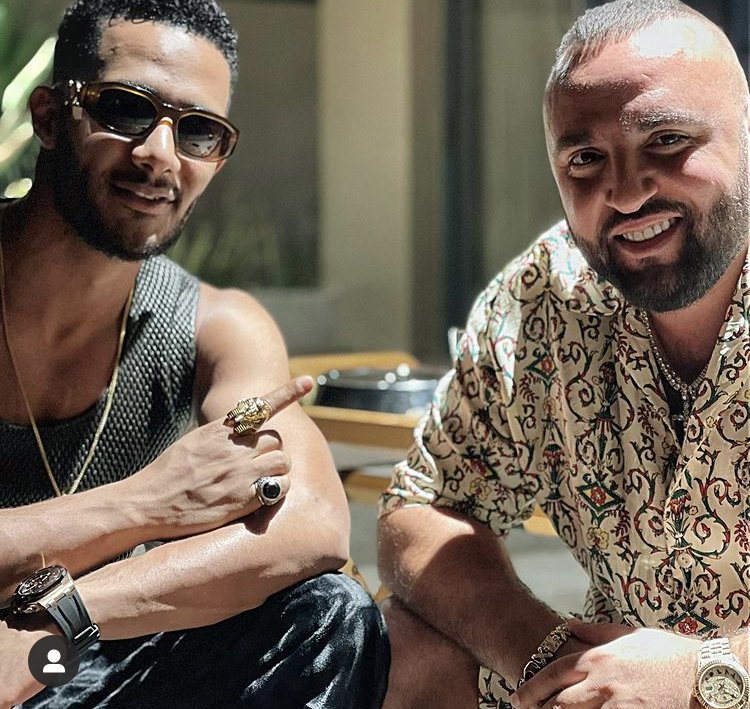 Mohamed Ramadan dances with two flight attendants on private jet