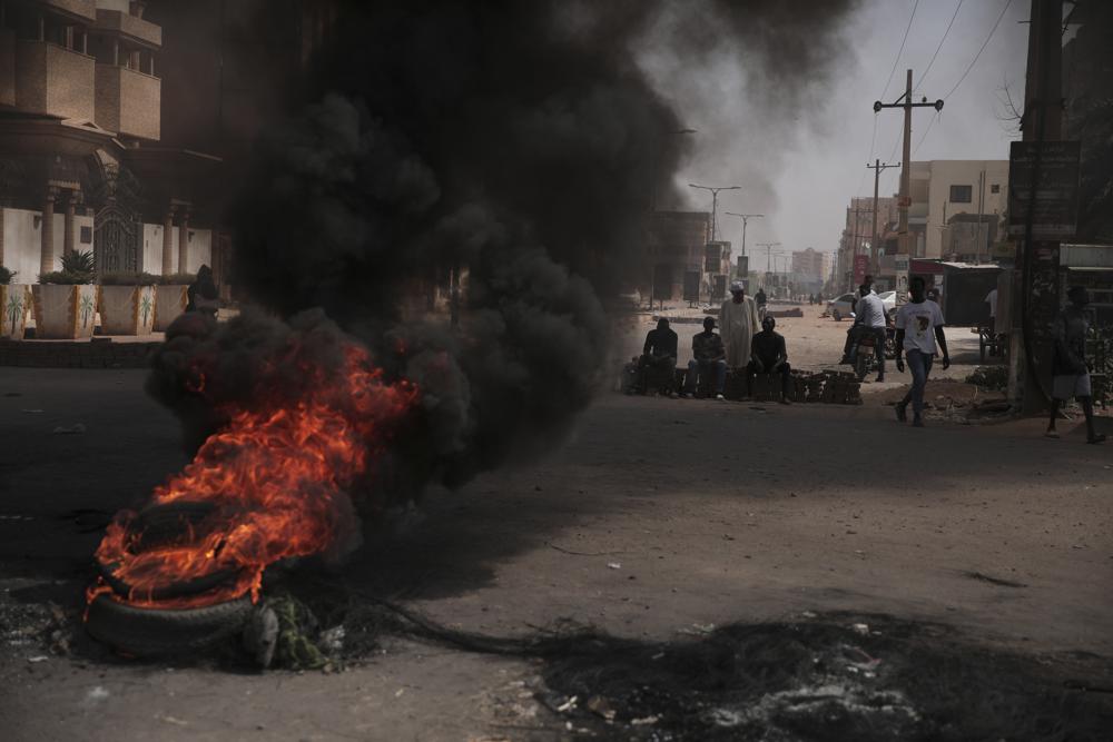 Sudan arrests 3 coup critics as pressure mounts on military