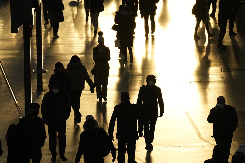Wary, weary world slams doors shut in face of new variant