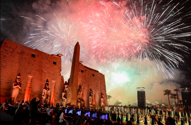 Fireworks explode during the opening ceremony for the restored Avenue of the Sphinxes or Road of the Rams, a 3,000-year-old avenue that connects Luxor Temple with Karnak Temple, in Luxor, Egypt, November 25, 2021. REUTERS/Mohamed Abd El Ghany