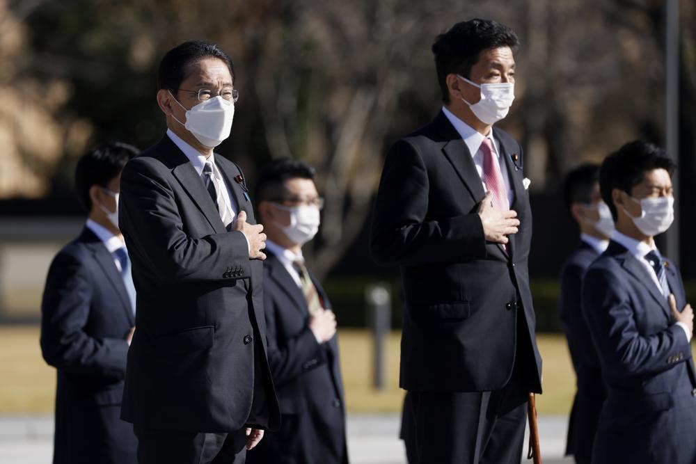 Japan PM vows to step up defense amid China, NK threats