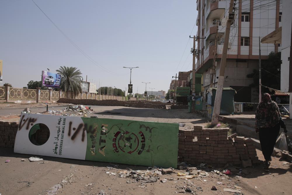 Sudanese rally against army tightening grip on power; 1 dead