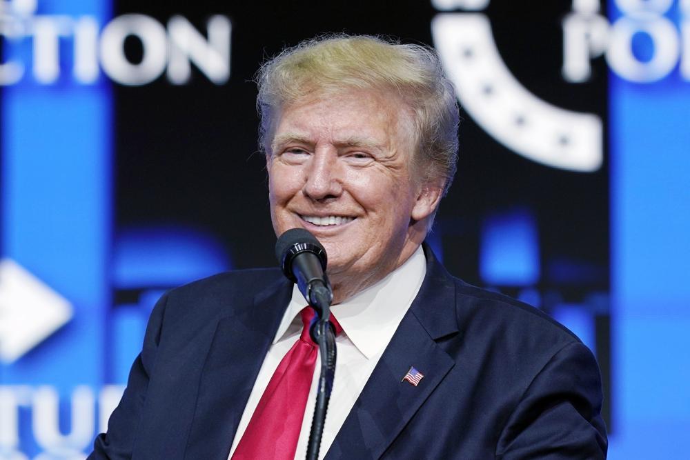 Trump reveals he got COVID-19 booster shot; crowd boos him