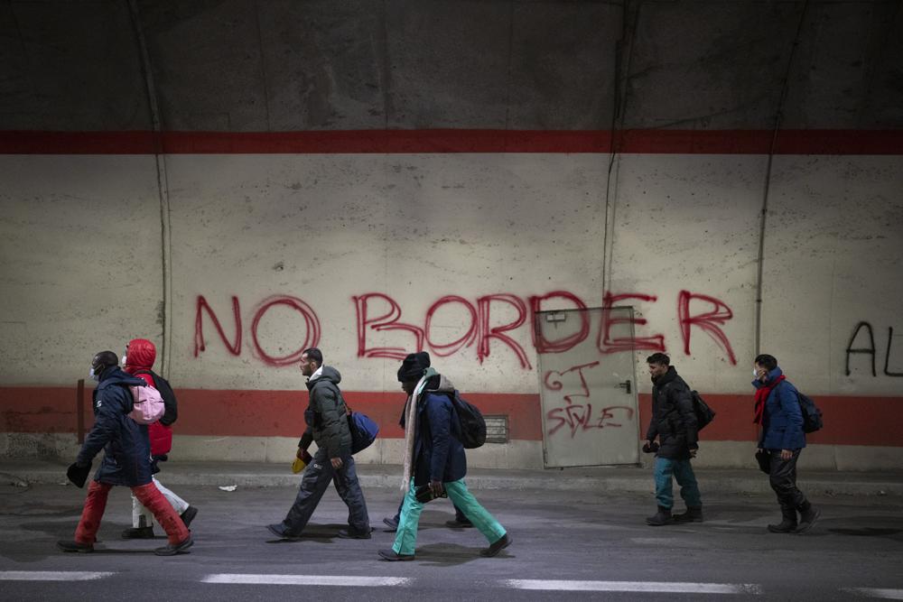 Freezing in the Alps, migrants find warm hearts and comfort