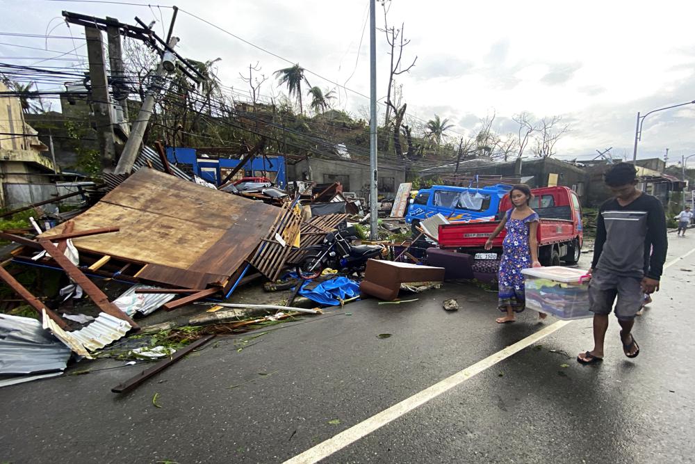 Typhoon leaves 19 dead, many homes roofless in Philippines