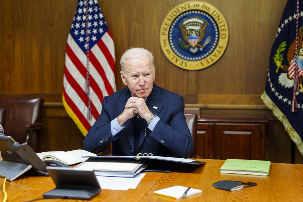 Biden warns Putin of &lsquo;severe costs&rsquo; of Ukraine invasion