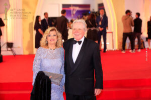 Actor Hussein Fahmy, head of the festival, and his wife at the Cairo International Film Festival.