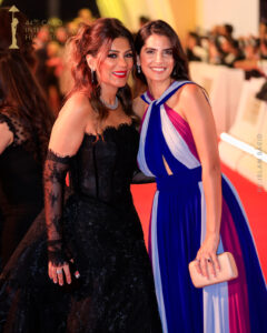 Actresses Ingy al-Mokadem and Carmen Bsaibes at the Cairo International Film Festival.