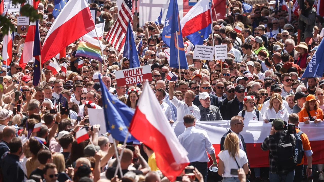 Poland's opposition brings hundreds of thousands onto streets to protest against nationalist government - Vimarsana News