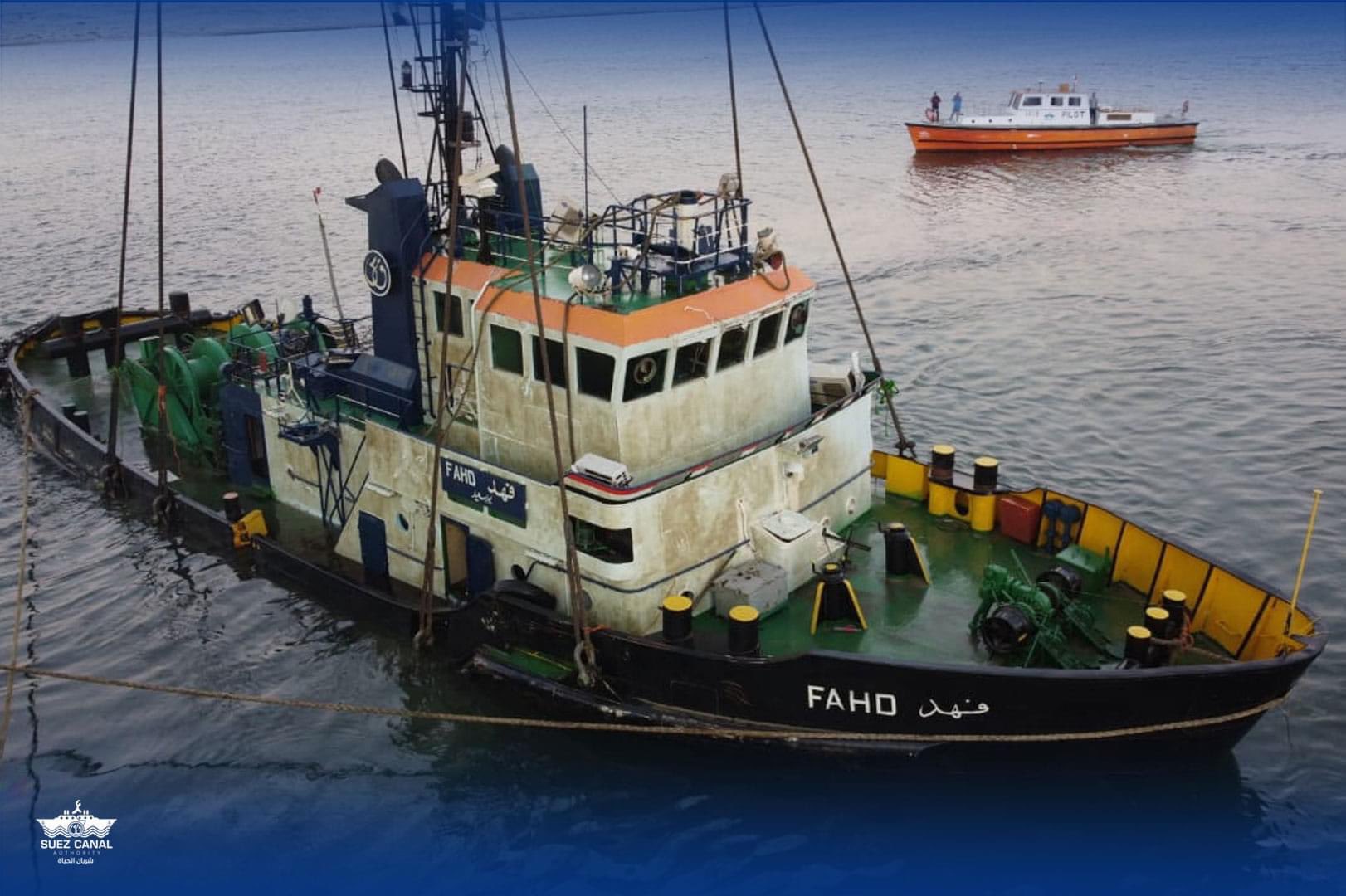 Photos: Egypt recovers sunken tugboat in Suez Canal