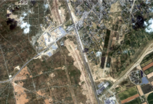 This satellite image from Maxar Technologies shows Egypt building a miles-wide buffer zone and border wall along its border with Gaza. Maxar Technologies