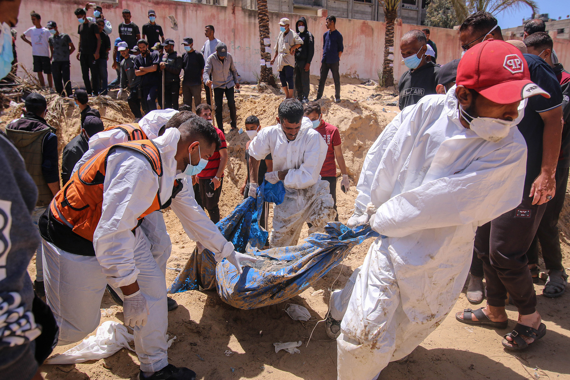 More than 200 bodies found in mass grave in Nasser hospital, says Gaza Civil Defense