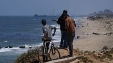 A ship is seen off the coast of Gaza near a US-built floating pier that will be used to facilitate aid deliveries on May 16, 2024. Abdel Kareem Hana/AP