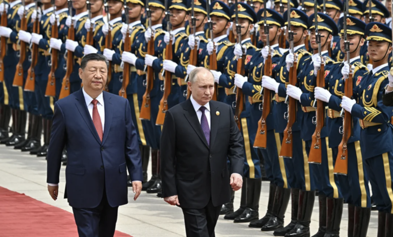 Russian President Vladimir Putin and Chinese leader Xi Jinping attend an official welcoming ceremony in front of the Great Hall of the People in Tiananmen Square in Beijing on May 16, 2024. Sergei Bobylov/Pool/AFP/Getty Images