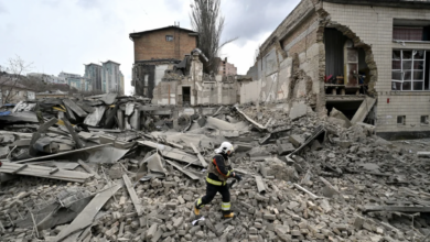 A Ukrainian rescuer works at the site of a missile attack in Kyiv, Ukraine on March 25, 2024. Sergi Supinsky/AFP/Getty Images