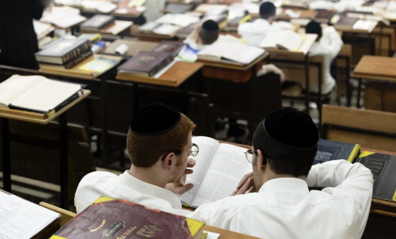 Ultra-Orthodox Jewish men study Torah in a yeshiva on June 2, 2024 in Bnei Brak, Israel. Amir Levy/Getty Images