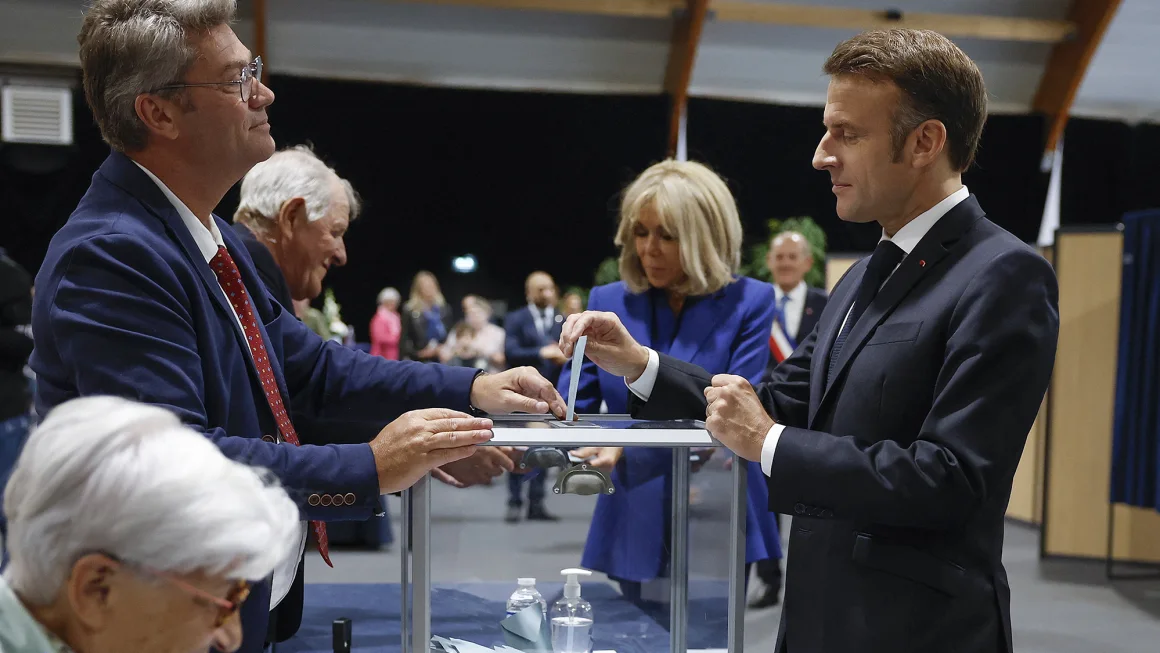 Macron urges new mainstream coalition, appearing to rule out working with the far left