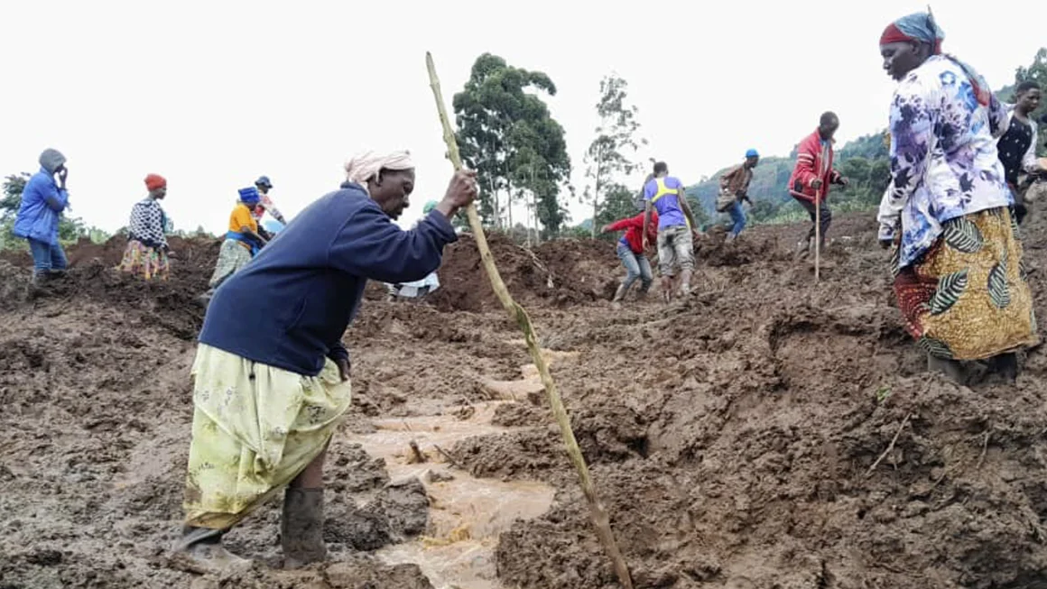 At least 15 killed and more than 100 missing after landslides bury homes in Uganda