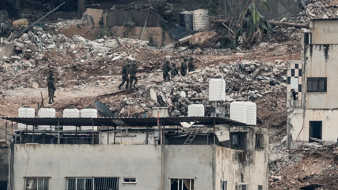 Israel demolishes West Bank apartment buildings as military campaign displaces tens of thousands of Palestinians