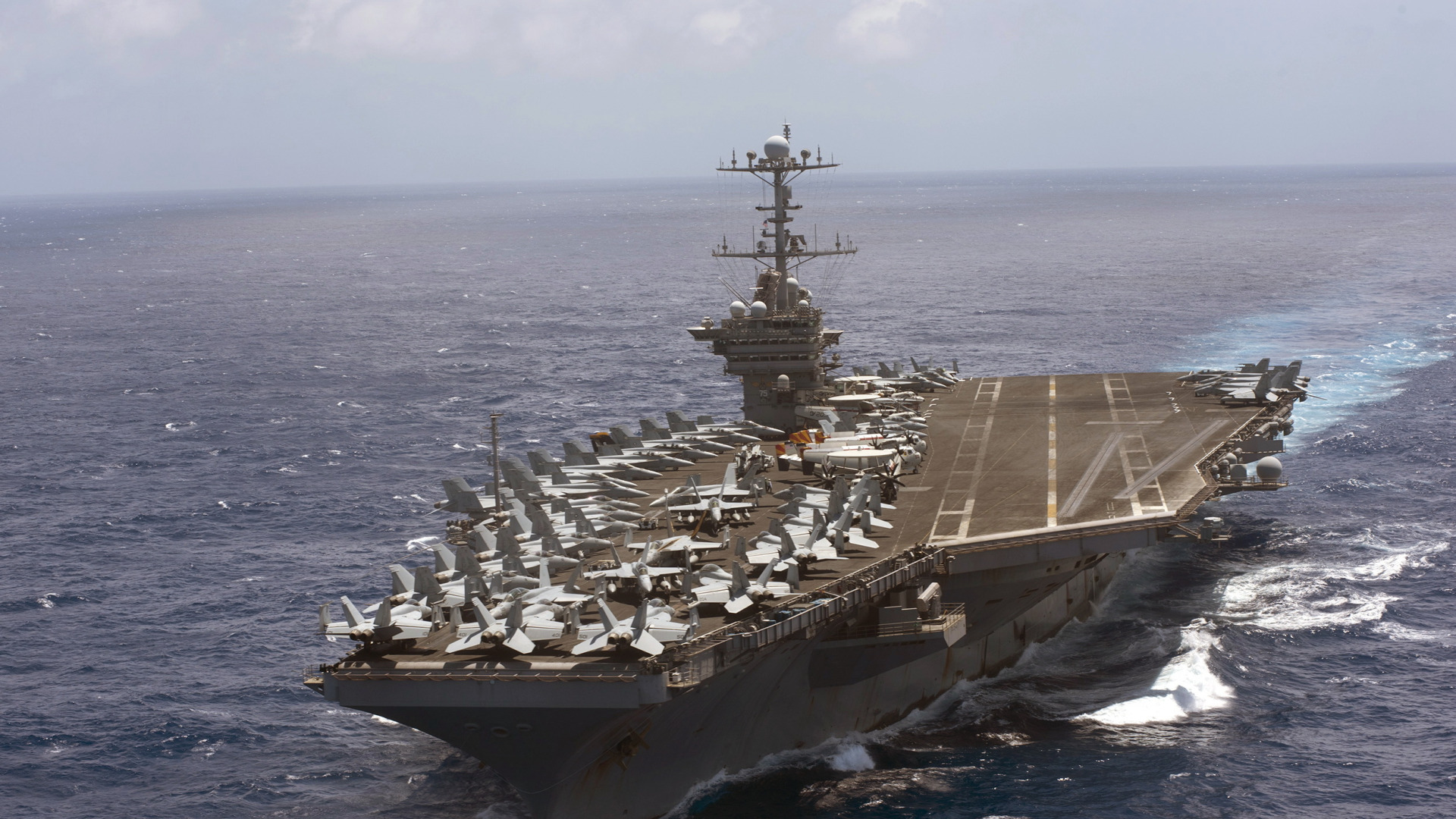 US aircraft carrier commander relieved of duty following collision with ship near Suez Canal