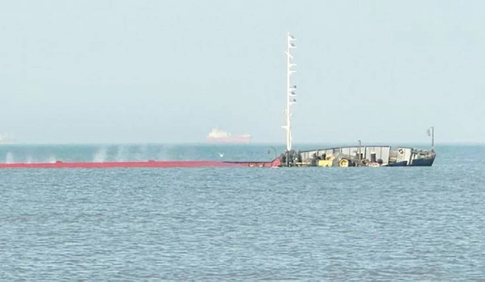 Warnings raised over sunken cargo ship in Port Said