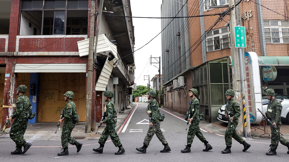 As Taiwan steels its defenses against China, some are hatching escape plans