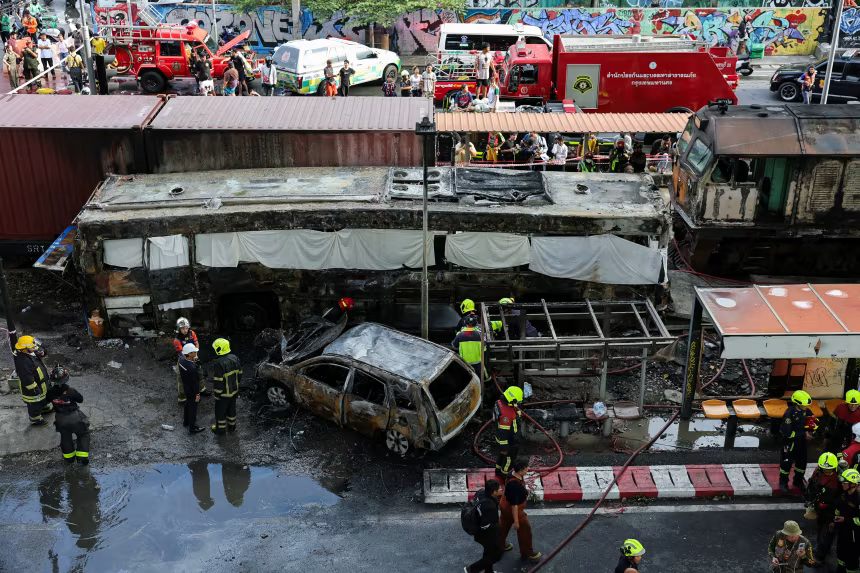 At least eight dead, 25 injured in train collision that sparked bus fire in Thailand