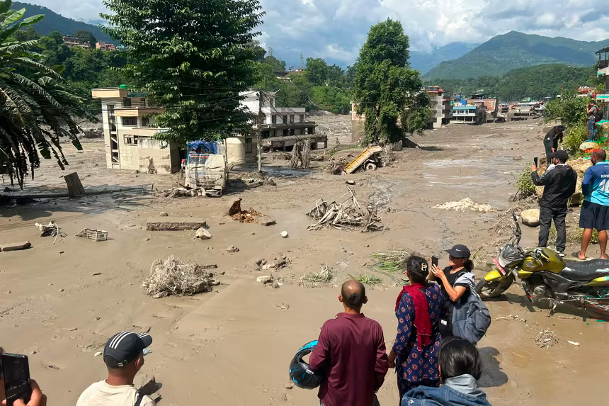 Nepal flash flood kills eight; damages roads, power projects