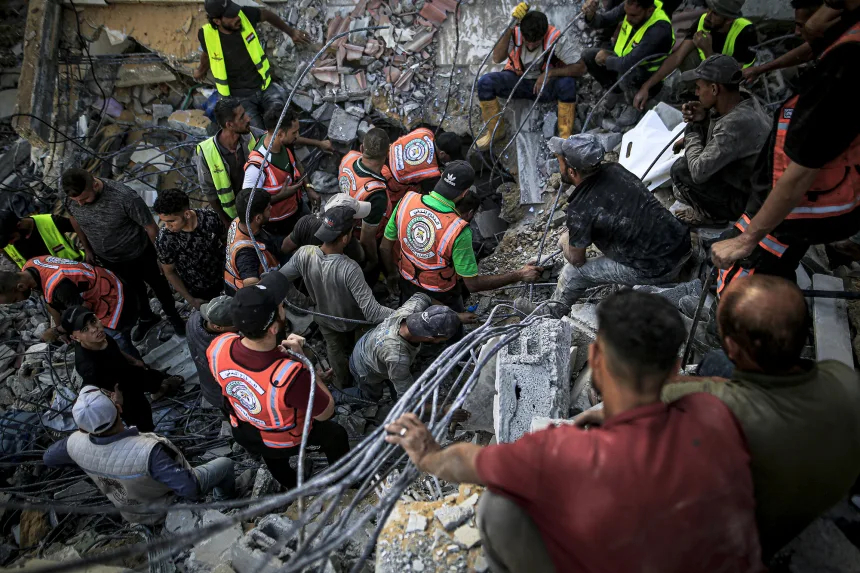 Gaza building collapse kills more than 20, dozens remain trapped under rubble Gaza building collapse kills more than 20, dozens remain trapped under rubble